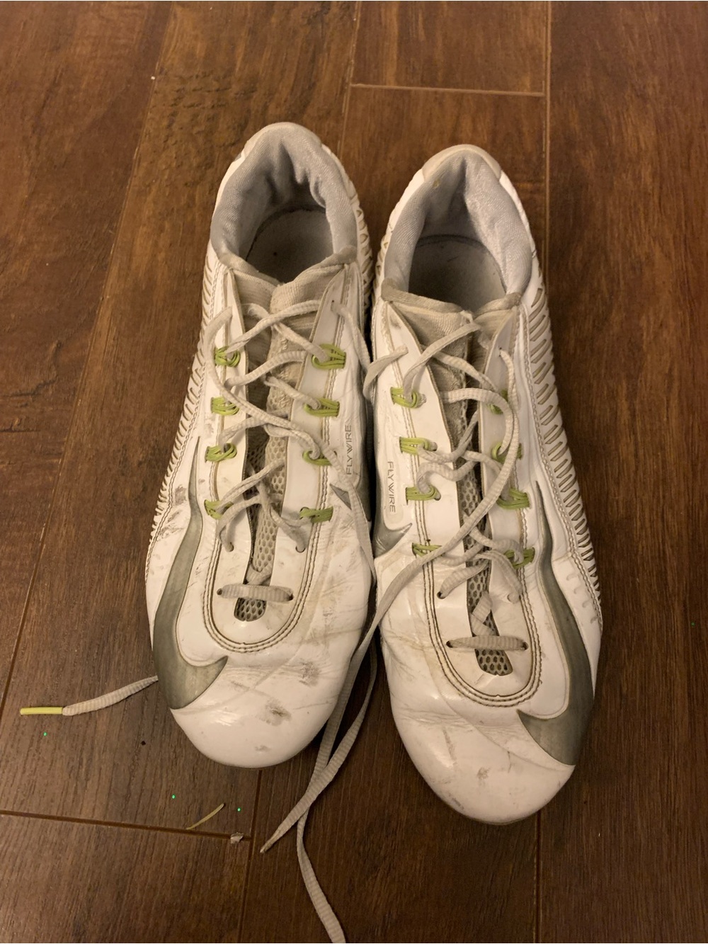 Men’s Nike White soccer cleats with Light Green Accents